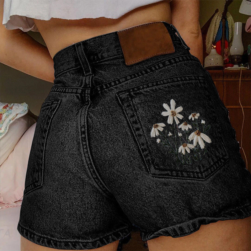 Franka | Zomerse denim short met madeliefjes borduursel